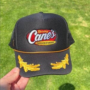 Raising Cane's Black and Gold Trucker Hat